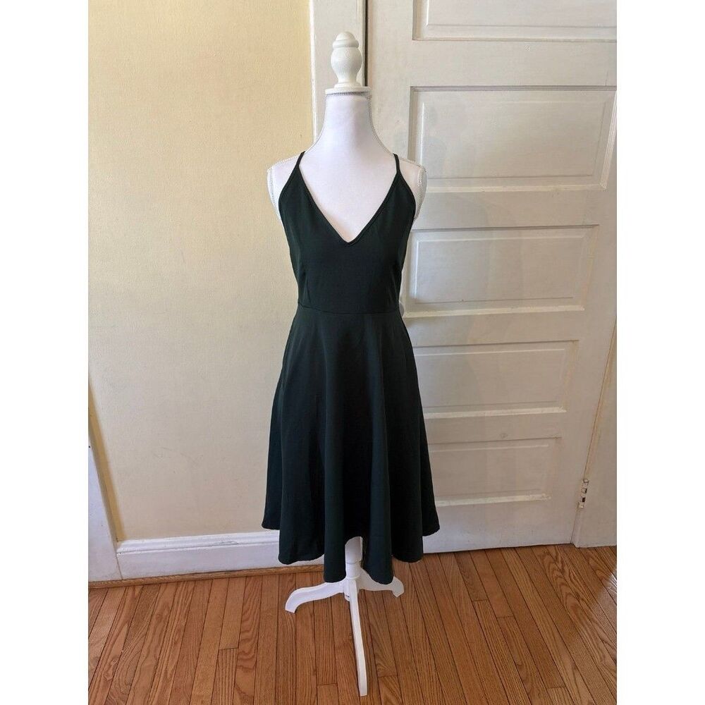 Green dress spaghetti strap vneck pockets low back stretchy form fitting midi
